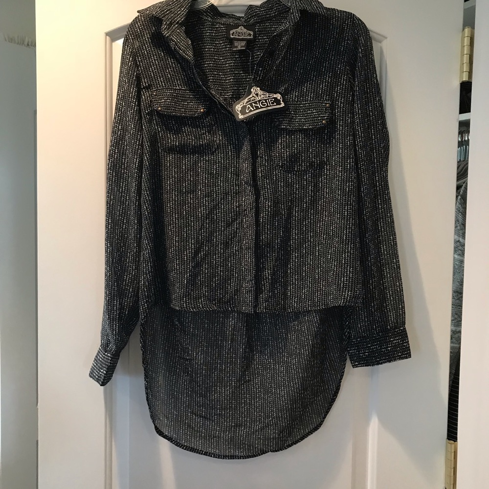Angie’s black and white blouse
